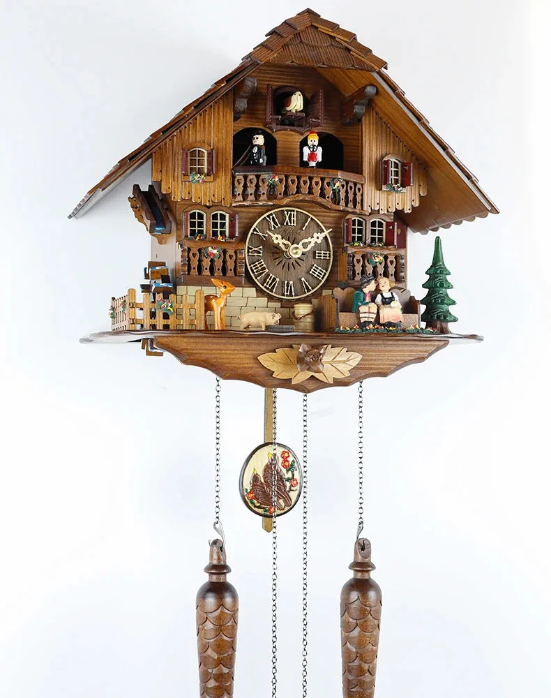 Wandklok koekoek, met Romeinse of Arabische wijzerplaat