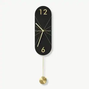Designer wandklokken, met lange of ronde slinger